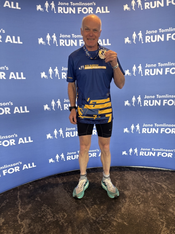 John Boothman with his medal